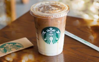 An iced Starbucks drink on a wooden table